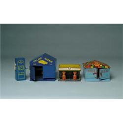 THREE TIN TOY GARAGES
