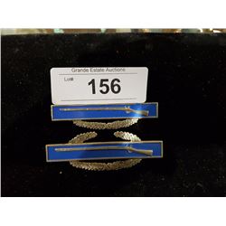 PAIR OF STERLING SILVER US RIFLEMAN PINS