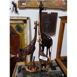 THREE AFRICAN HAND CARVED GIRAFFES