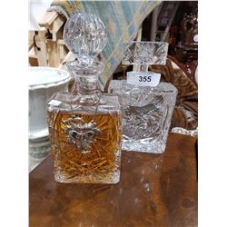 TWO PINWHEEL CRYSTAL DECANTERS W/ CONTENTS