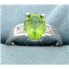 Image 1 : Oval 1.85ct Peridot Ring with Diamonds