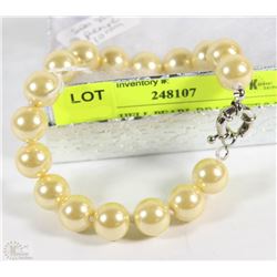 #6-SEA SHELL PEARL BRACELET 7.5" LIGHT YELLOW