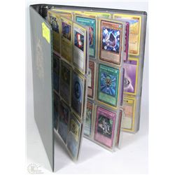 ALBUM OF 100 POKÉMON & 100 YU-GI-OH TRADING CARDS