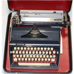 VINTAGE ADLER TYPEWRITER IN HARD CASE