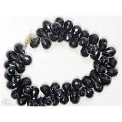 #9-10KT YELLOW GOLD BLACK ONYX BRACELET