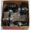 Image 1 : BOX WITH 4 LARGE BLACK CASTERS