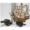 Image 1 : SMALL FLAT WITH MODEL SHIP AND 2 CAST IRON CANNONS