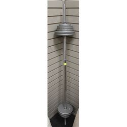 80LBS OF FREE WEIGHTS AND CURLING BAR