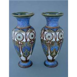 A pair of Royal Doulton vases, by Eliza Simmance, of ovoid form with stylised flowers and leaves,...