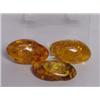 Image 1 : Three Natural Amber Cabochons