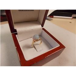 RING -STAMPED 14KH YELLOW GOLD WITH ROUND FACETTED OPAL- FROM ESTATE