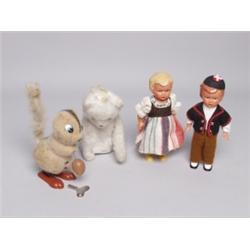 Four Vintage Wind-up Toys