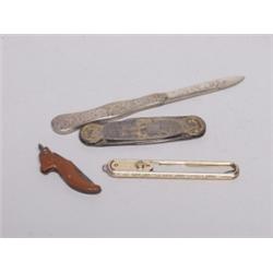 Four Collector's Pocket Knives