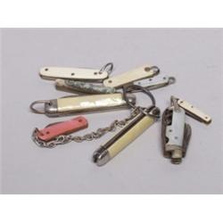 Nine Old Miniature Pocket Knives