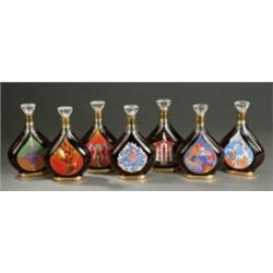 SET OF SEVEN ERTE DESIGNED BOTTLES