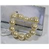 Image 1 : #9- SEA SHELL PEARL BRACELET 7.5" CREAMY MILK