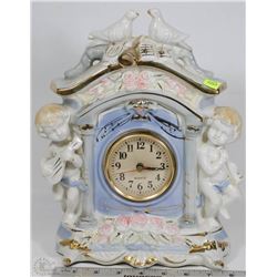 VINTAGE CERAMIC CHERUB WITH DOVES CLOCK