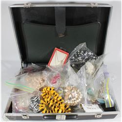 BRIEFCASE FULL OF JEWELRY
