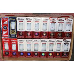 FLAT OF ASSORTED TITLEIST RECLAIMED GOLF BALLS