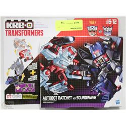 KRE-O TRANSFORMERS AUTOBOT RATCHET VS