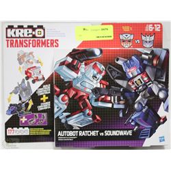 KRE-O TRANSFORMERS AUTOBOT RATCHET VS