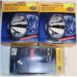 TWO HELLA RALLYE 4000 METAL HALOGEN LIGHTS AND ONE