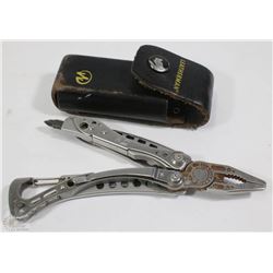 LEATHERMAN SKELTOOL IN CASE