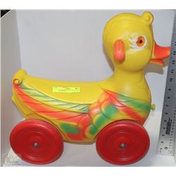 VINTAGE KIDS REGAL PULL DUCK WITH WHEELS