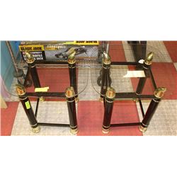SET OF TWO BLACK AND GOLD TONED GLASS TOP END