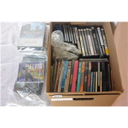 BOX OF DVDS CDS AND PLAY STATION GAMES