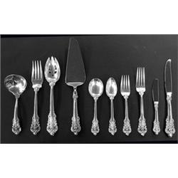 EIGHTY-EIGHT PIECE STERLING SILVER FLATWARE SET, American. Maker: Wallace. In the "Grande Baroq...