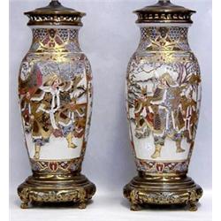 FINE PAIR OF SATSUMA POTTERY VASES, Japanese. Circa 1900. Each of tapering ovoid form decorated...