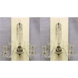 GOOD PAIR OF REGENCY BRASS AND GLASS TWO LIGHT SCONCES, 19th Century. Each oval patera form bac...