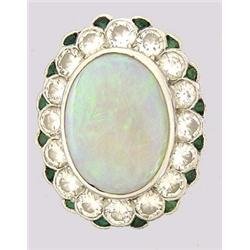 VERY FINE OPAL, DIAMOND AND EMERALD RING, English. London 1960. Maker's mark: Wt. Ltd. Centered...