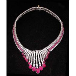 IMPORTANT DIAMOND AND RUBY NECKLACE, Set with approximately five hundred, eighteen round cut di...