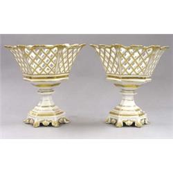 PAIR OF OLD PARIS PORCELAIN FRUIT STANDS, French. 19th Century. Each with a reticulated hexagon...