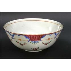 GOOD EXPORT PORCELAIN BOWL, Chinese. 19th Century. The interior centered by a bouquet, the exte...