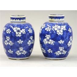 PAIR OF BLUE AND WHITE PORCELAIN JARS AND COVERS, Chinese. Kangxi Period. 1662-1722. Each of ov...