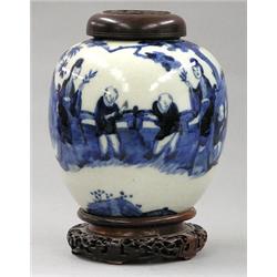 BLUE AND WHITE PORCELAIN JAR AND WOOD COVER, Chinese. Kangxi mark but 19th Century. Of ovoid sh...