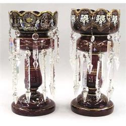 TWO ENAMEL DECORATED GLASS LUSTERS, European. Each deep burgundy vessel with floral pattern and...