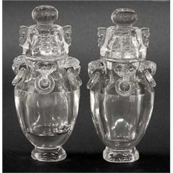 PAIR OF ROCK CRYSTAL VASES AND COVERS, Chinese. Each of flattened form, carved with loose rings...