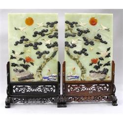 PAIR OF SERPENTINE JADE TABLE SCREENS, Chinese. Each of rectangular shape, overlaid with variou...
