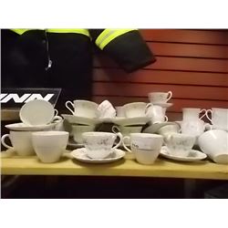 TEA CUPS AND SAUCERS