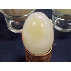 POLISHED STONE CARVED EGG - CLEAR WITH SWIRLS