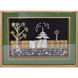 Handmade art made of seashell on a black velvet