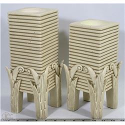 PAIR OF IVORY FINISHED CANDLE HOLDERS