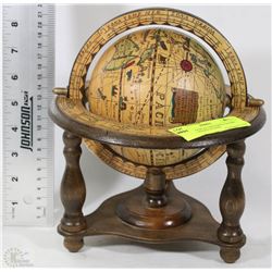ASTROLOGICAL SPINNING GLOBE ON A WOODEN STAND