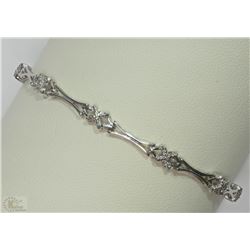 #35-10KT WHITE GOLD  "X" LINK DIAMOND BRACELET