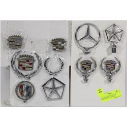 2 FLATS OF 60'S & 70"S VEHICLE EMBLEMS INCL