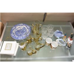 SHELF LOT OF COLLECTIBLE PLATES AND HOT DRINK GLASSES